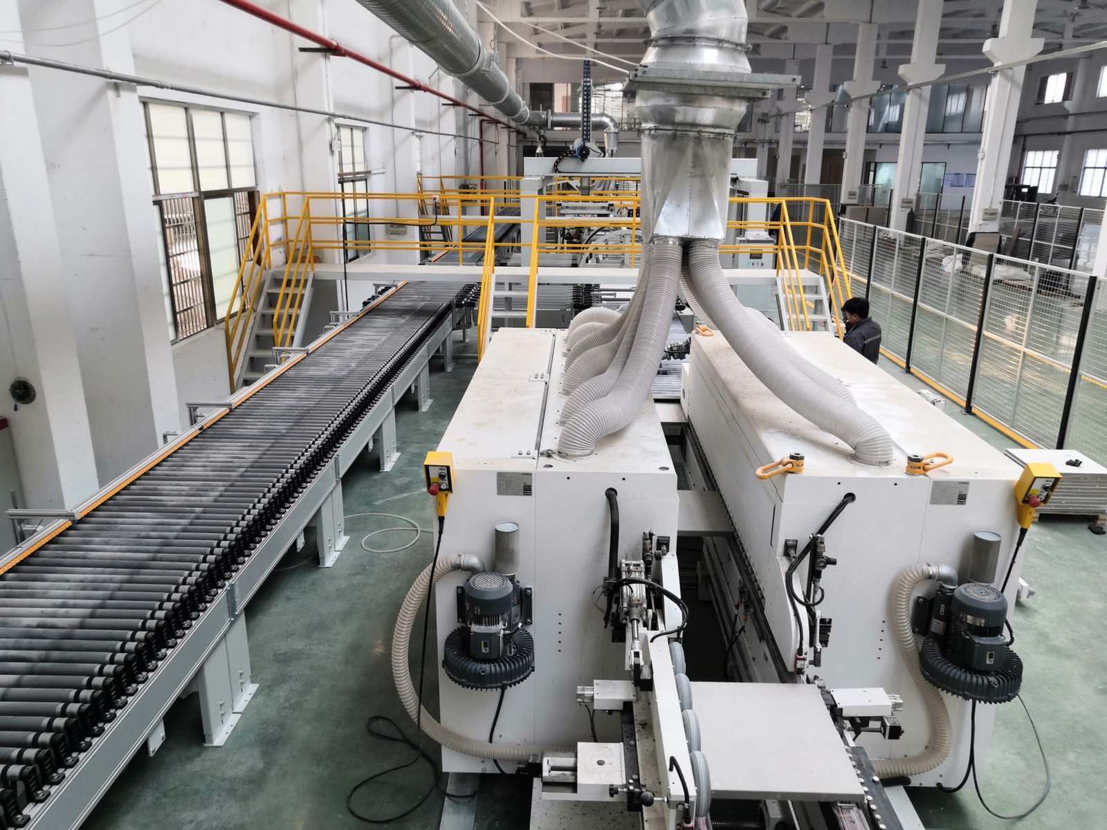 Profloortech surface lamination line -- HPL and PVC finishing